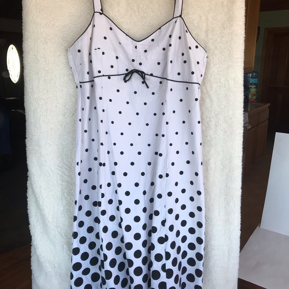 Polka dot dress with adjustable straps. Only worn once, like new